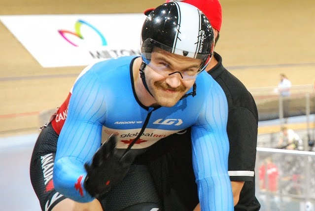 Ryan Dodyk waving to the crowd before the keirin final of the track nations cup held in Milton, Ontario